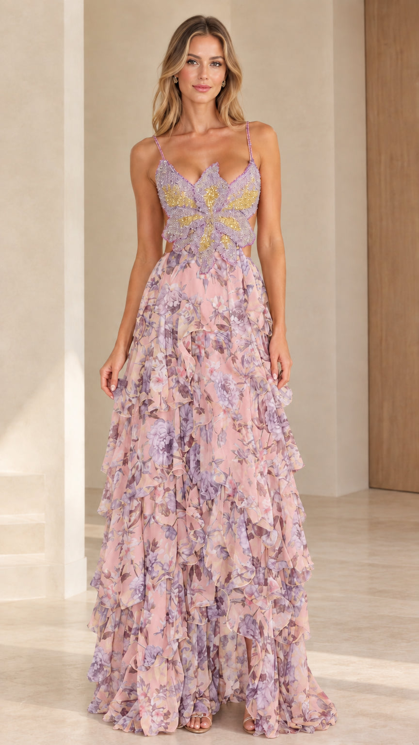 Front view of model wearing pink floral butterfly beaded tiered maxi dress