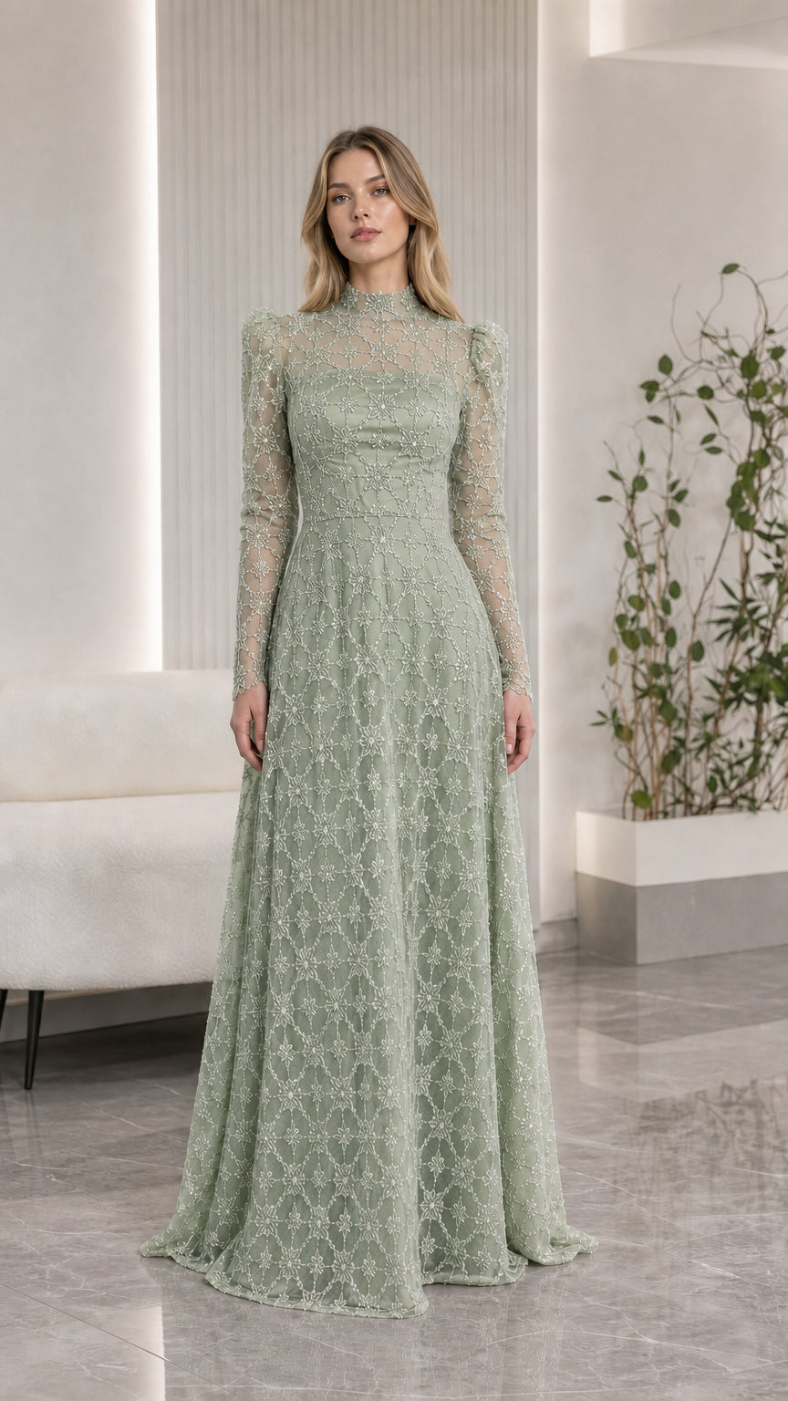 Front view of sage green beaded long sleeve formal A-line gown