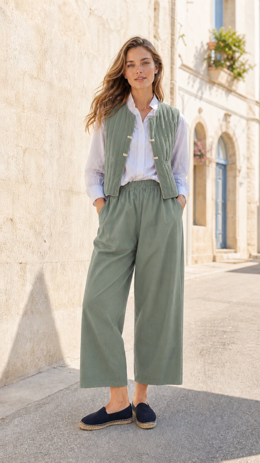 Woman wearing Sage quilted vest and wide-leg pants co-ord set