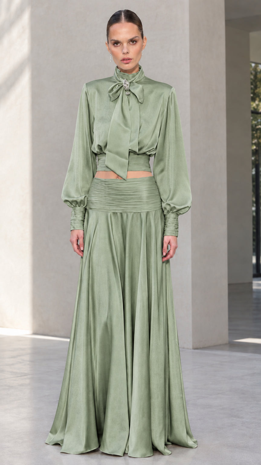 Full-length front view of sage green satin bow tie blouse and maxi skirt set