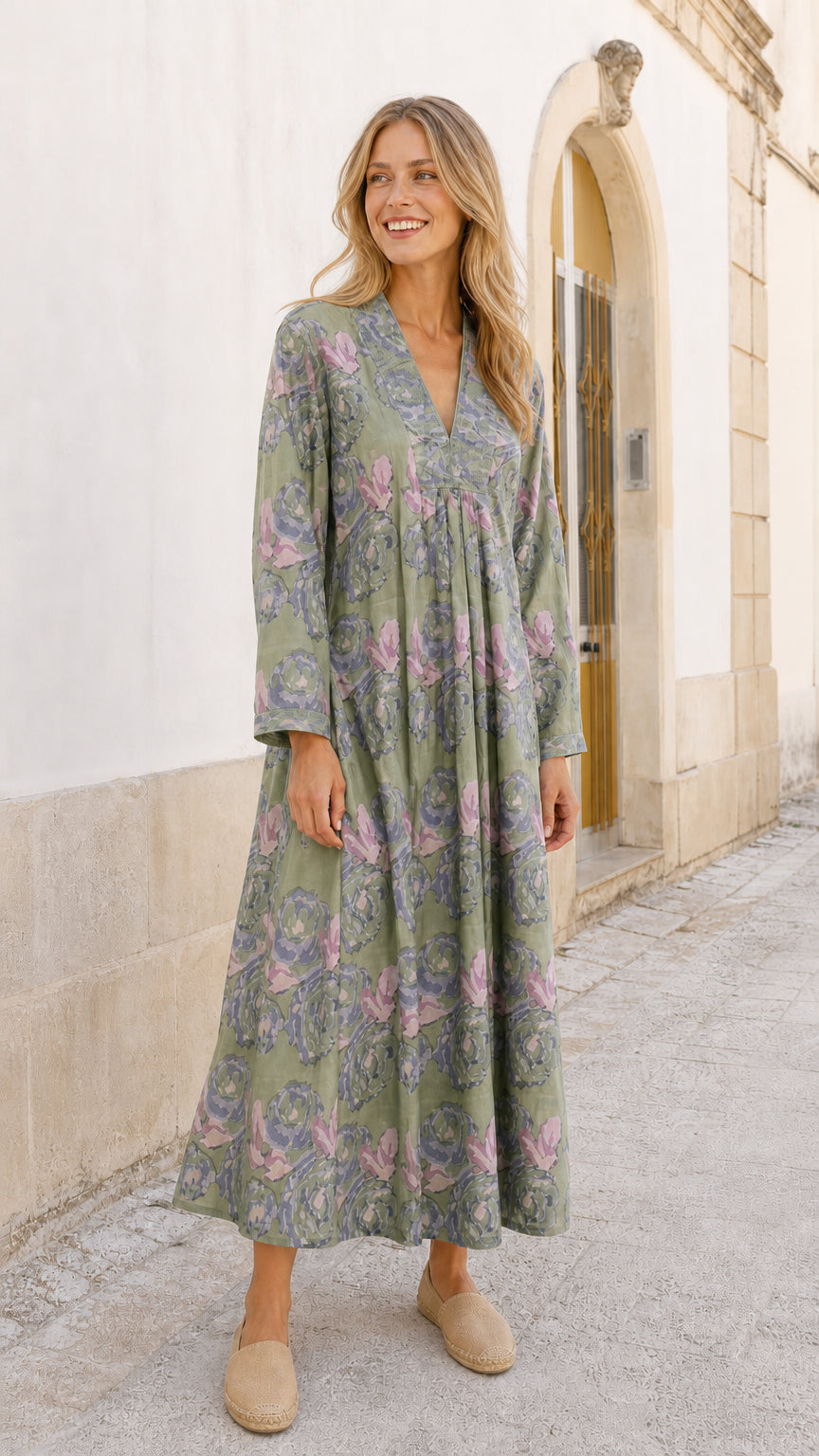 Model wearing green floral maxi dress