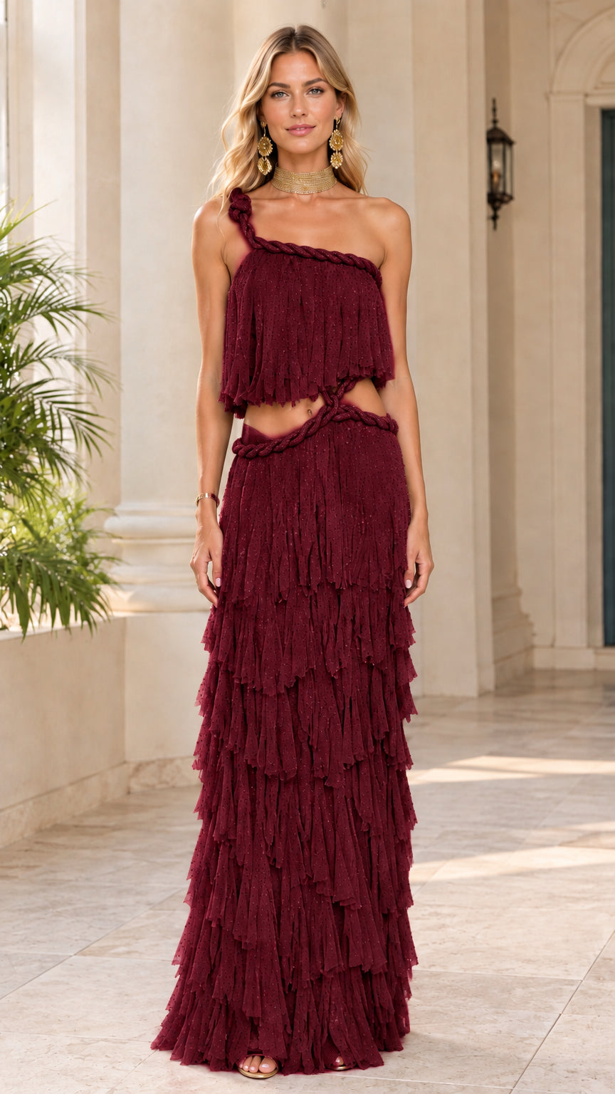 Front view of model wearing burgundy one-shoulder tiered ruffle cutout maxi dress