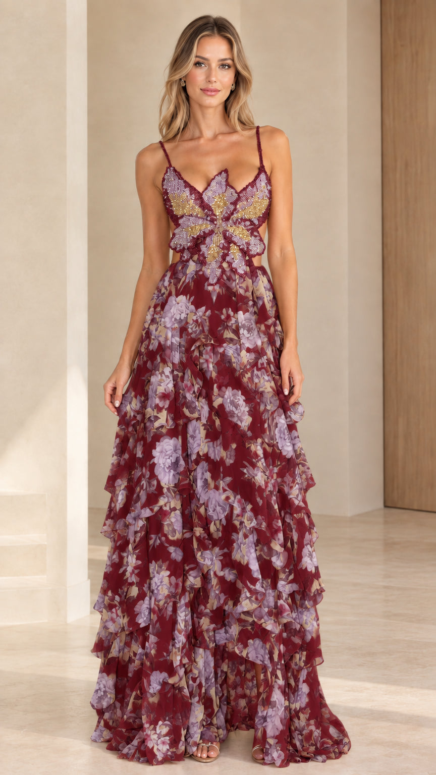Front view of model wearing burgundy floral butterfly beaded tiered maxi dress