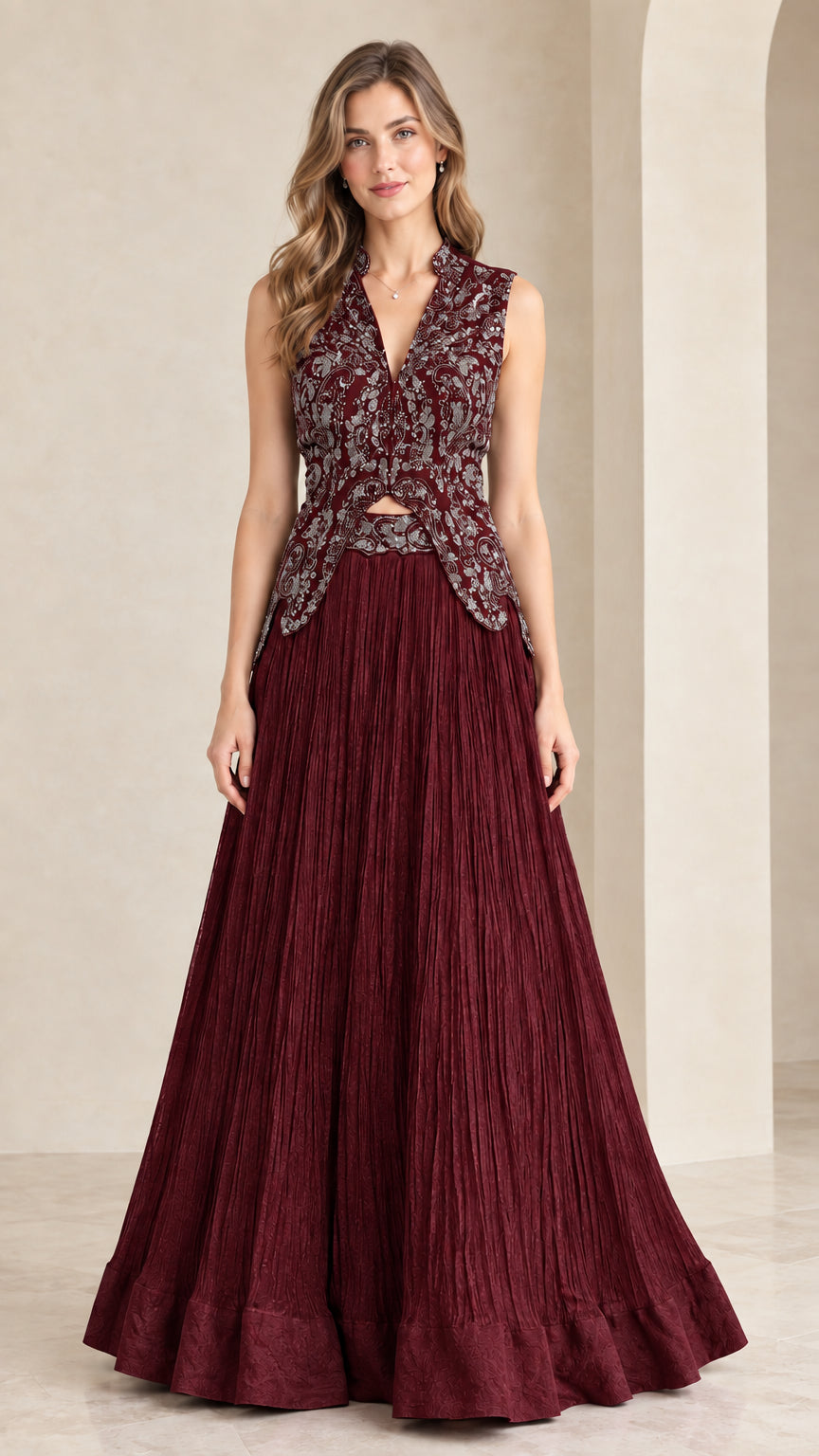 Front view of woman wearing burgundy wine embroidered sleeveless maxi gown set