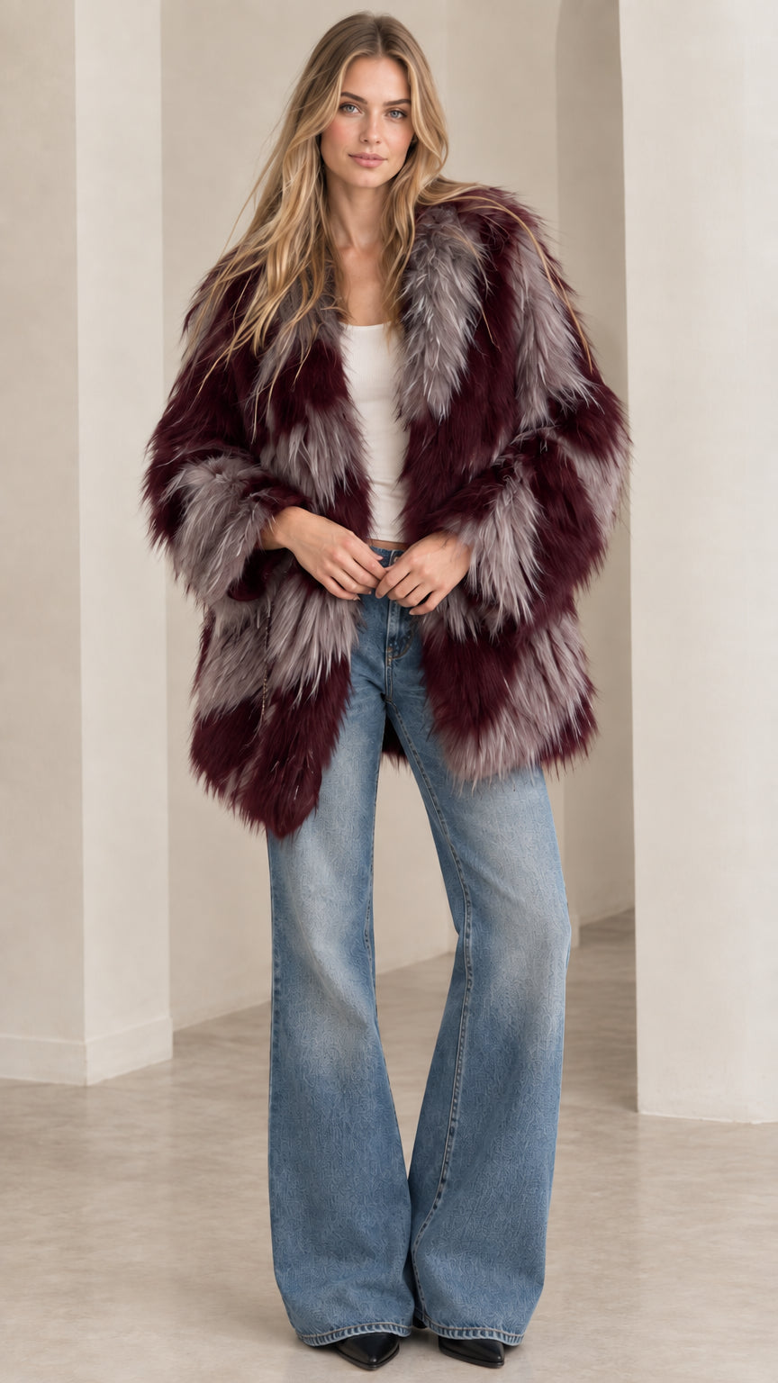 Model wearing burgundy wine and grey chevron shaggy faux fur coat