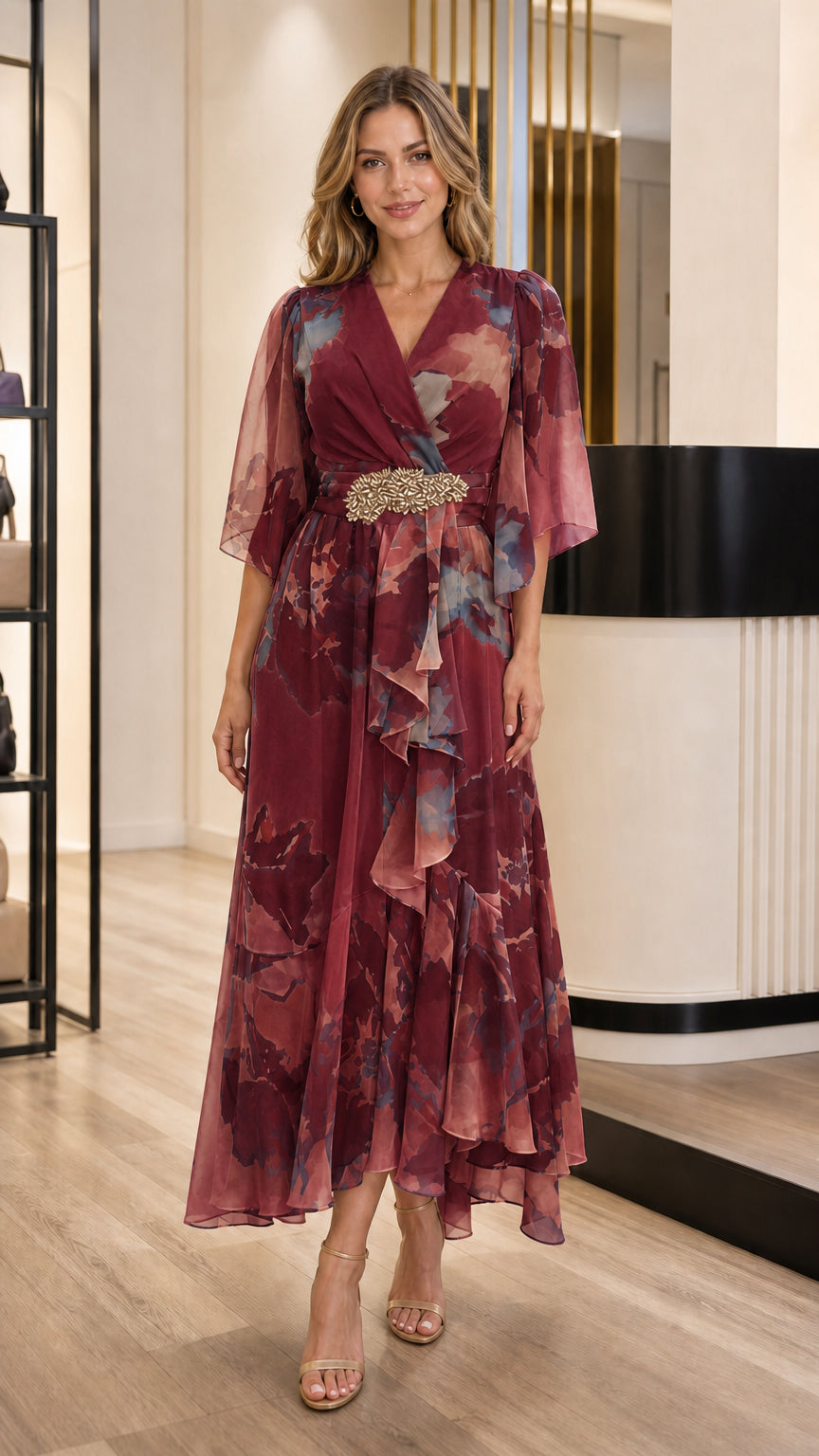Model wearing Burgundy floral chiffon maxi gown with embellished waistline
