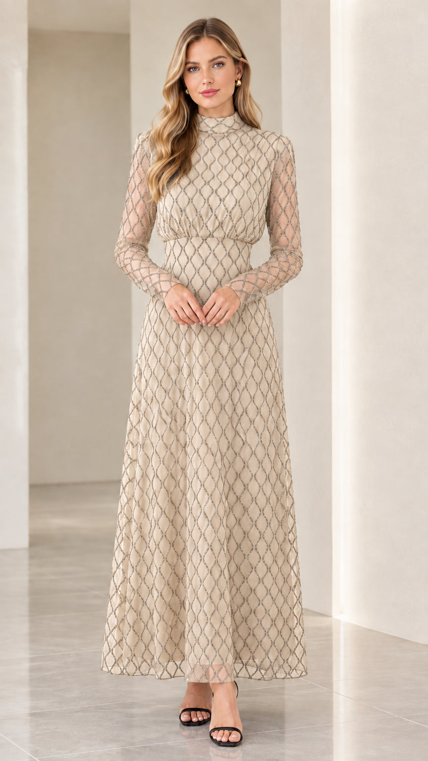 Front full view of woman wearing champagne beige geometric long sleeve maxi dress