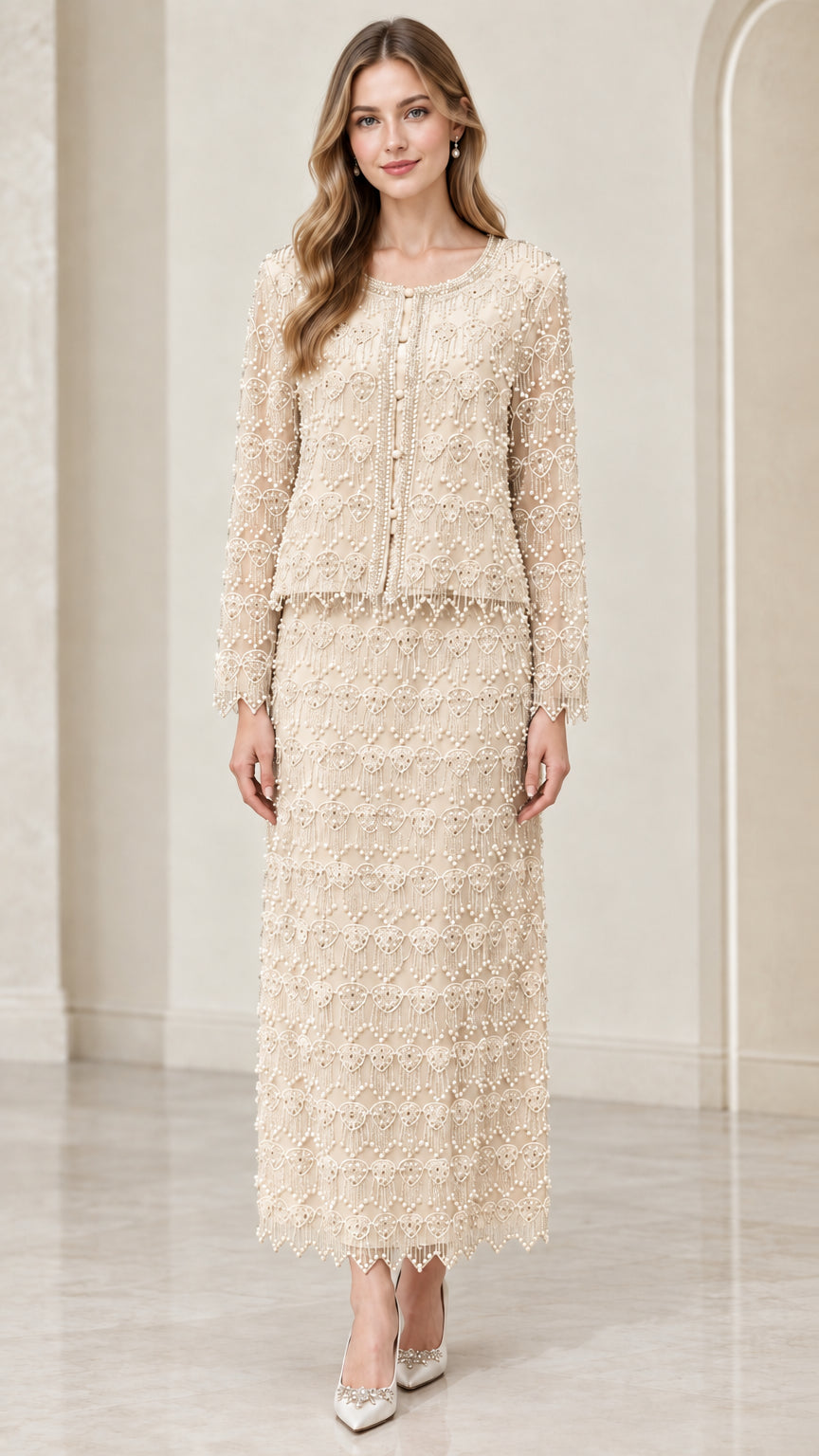 Front full-length view of woman wearing champagne cream beaded two-piece maxi skirt suit