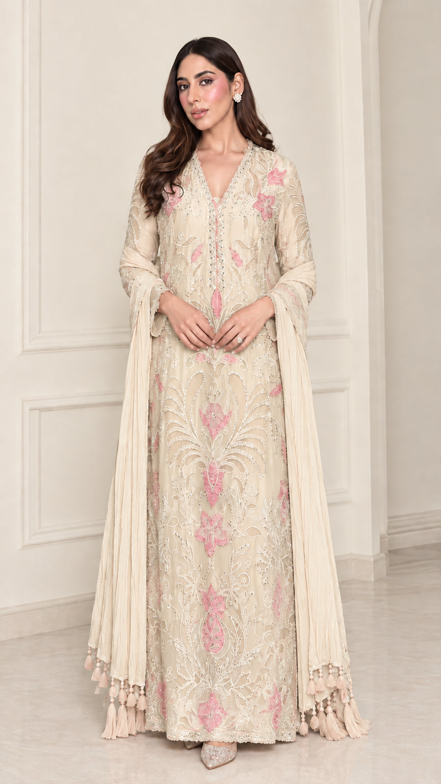 Full-length view of elegant cream floral embroidered evening maxi gown