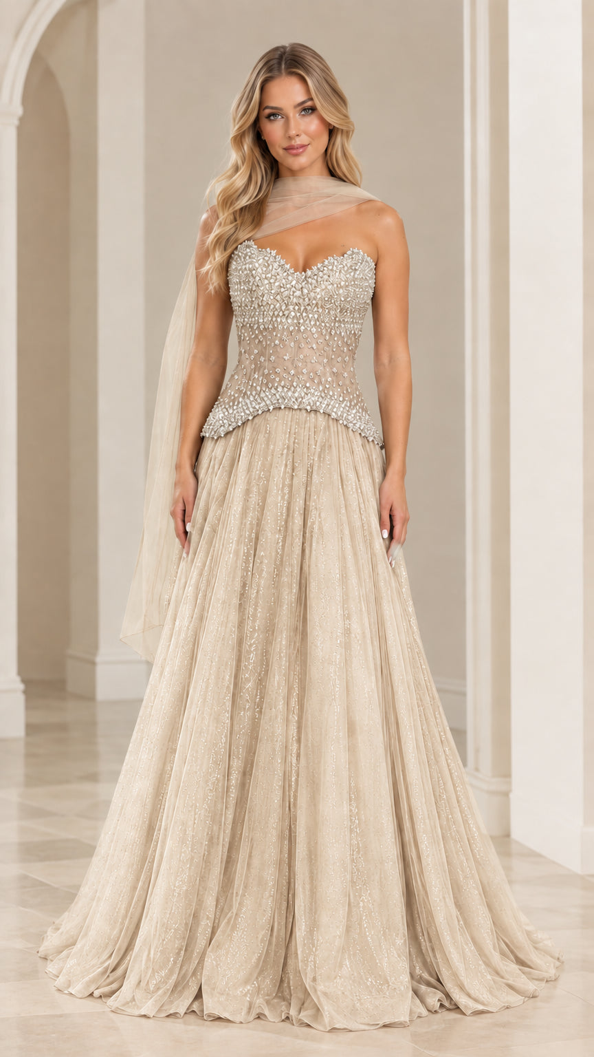 Full front view of champagne strapless beaded corset ball gown with flowing tulle skirt