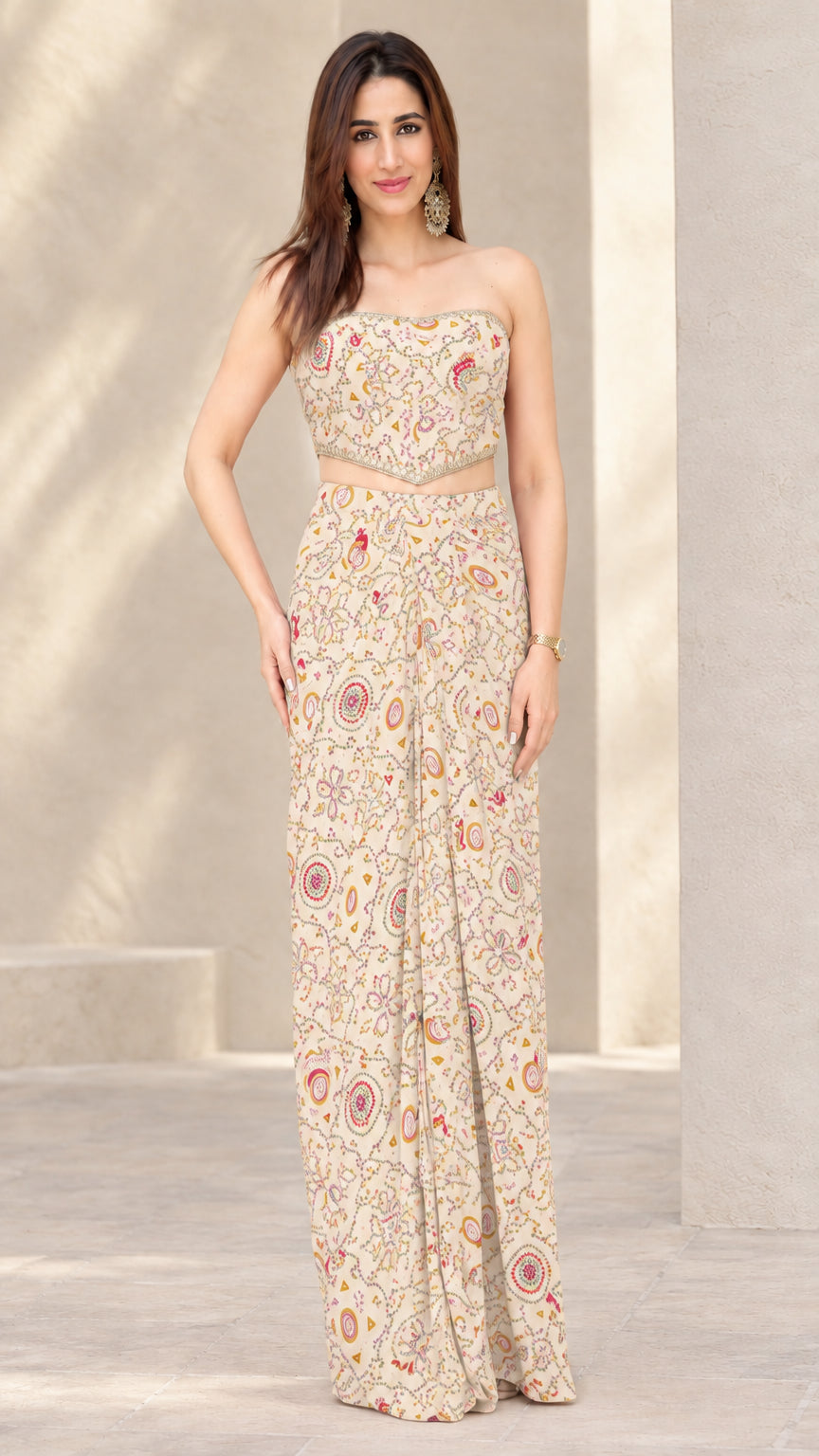 Woman wearing Cream printed strapless crop top and draped skirt co-ord set